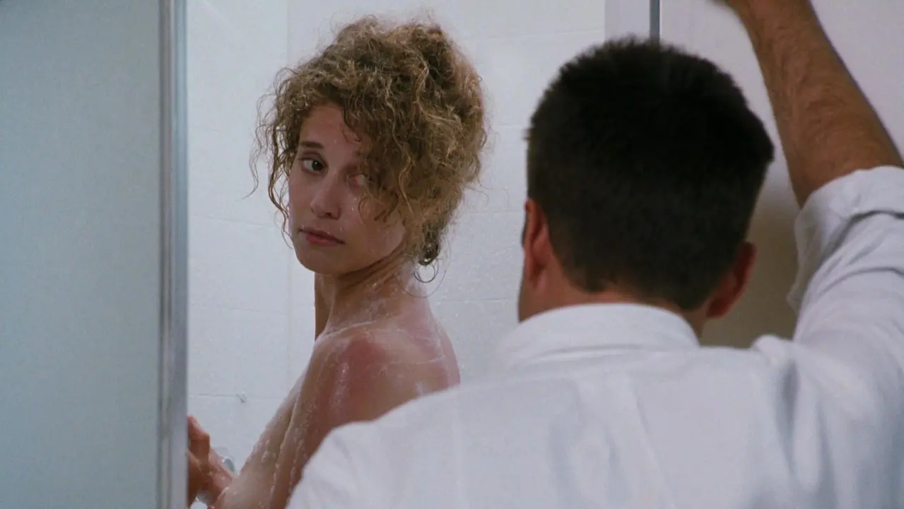 Nancy Travis nude, Annabella Sciorra nude - Internal Affairs (1990)