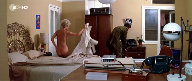 Delphine Seyrig nude – The Black Windmill (1974)