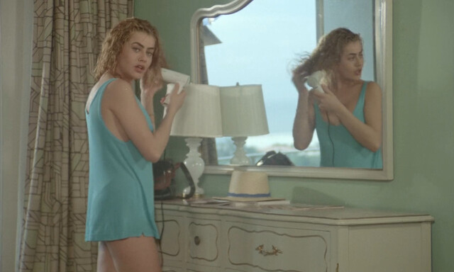 Eva Grimaldi nude – Rat Man (1988)