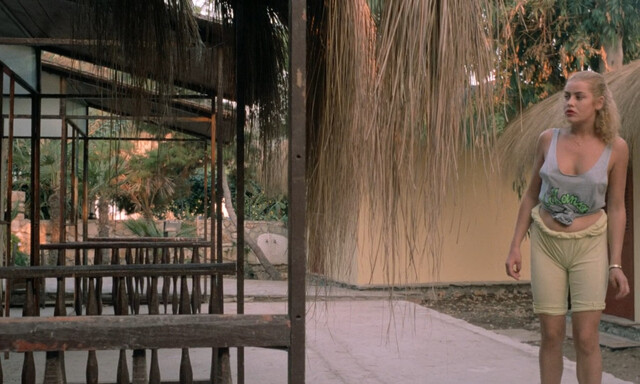 Eva Grimaldi nude – Rat Man (1988)