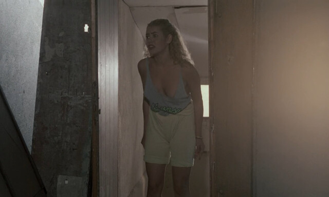 Eva Grimaldi nude – Rat Man (1988)