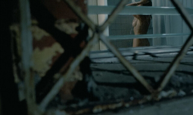 Eva Grimaldi nude – Rat Man (1988)