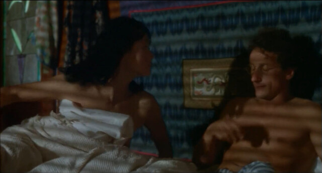 Julia Nickson nude – K2 (1991)