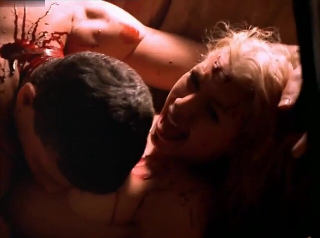 Kari Wuhrer nude - An Occasional Hell (1996)